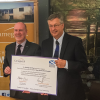 Kevin Stewart MSP signing the Scotland's Town's Pledge